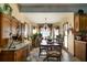 Inviting dining area with multiple windows, offering natural light and views at 680 Milligan Creek Rd, Roopville, GA 30170