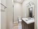 Contemporary bathroom featuring a vessel sink, modern vanity, and walk-in shower at 8069 Kenstone Ct, Sandy Springs, GA 30350