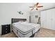 Tastefully decorated bedroom with ceiling fan and wardrobe, providing a cozy and inviting space at 8069 Kenstone Ct, Sandy Springs, GA 30350
