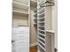 Custom closet with multiple shelves and drawers for optimal organization and storage at 8069 Kenstone Ct, Sandy Springs, GA 30350