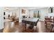 Game room with a pool table and a living room area at 8069 Kenstone Ct, Sandy Springs, GA 30350