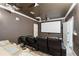 Cozy home theater features reclining seats, a large screen, and overhead lighting for a cinema experience at 8069 Kenstone Ct, Sandy Springs, GA 30350