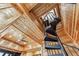 Unique spiral staircase with wood accents and a ceiling fan, creating an architectural focal point at 8069 Kenstone Ct, Sandy Springs, GA 30350