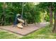 A safe and fun playground area with swings and a slide, perfect for families at 210 Trailmore Ct, Roswell, GA 30076