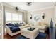 Cozy living room with comfortable seating, natural light, and stylish decor at 5877 Stow Dr, Tucker, GA 30084