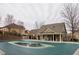 Community pool with covered seating area, perfect for relaxation and socializing at 5877 Stow Dr, Tucker, GA 30084