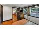 Cozy bedroom with hardwood floors, a dresser, and good natural lighting at 8065 Highway 92 Dallas, Douglasville, GA 30134