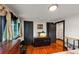 Bedroom featuring dark trim, hardwood floors, and natural light at 8065 Highway 92 Dallas, Douglasville, GA 30134