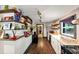 Galley-style kitchen featuring plenty of storage and view of the dining room at 8065 Highway 92 Dallas, Douglasville, GA 30134