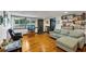 Comfortable living room showcasing beautiful hardwood floors, a plush sofa, and a relaxing atmosphere at 8065 Highway 92 Dallas, Douglasville, GA 30134