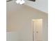 Bedroom featuring bathroom doorway with light-colored walls and ceiling fan at 120 Chastain Nw Rd # 1104, Kennesaw, GA 30144