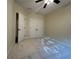 Bedroom featuring carpet flooring, neutral walls, and a closet at 120 Chastain Nw Rd # 1104, Kennesaw, GA 30144