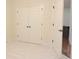 Bedroom with double doors to closet space, offering ample storage at 120 Chastain Nw Rd # 1104, Kennesaw, GA 30144