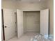 Empty closet with double doors and wire shelving at 120 Chastain Nw Rd # 1104, Kennesaw, GA 30144