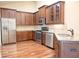 Spacious kitchen with granite countertops, stainless steel appliances and wooden cabinets at 120 Chastain Nw Rd # 1104, Kennesaw, GA 30144