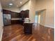 Modern kitchen with stainless steel appliances, granite countertops, and dark wood cabinetry at 120 Chastain Nw Rd # 1104, Kennesaw, GA 30144