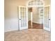 View through an arched doorway featuring the adjacent room at 120 Chastain Nw Rd # 1104, Kennesaw, GA 30144