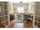 Inviting living room with hardwood floors, neutral decor, and plenty of natural light at 120 Chastain Nw Rd # 1104, Kennesaw, GA 30144