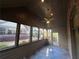 Cozy sunroom with multiple windows offering plenty of natural light at 120 Chastain Nw Rd # 1104, Kennesaw, GA 30144