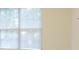 Close-up shot of a window with horizontal blinds, providing natural light and privacy at 120 Chastain Nw Rd # 1104, Kennesaw, GA 30144