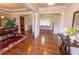 Spacious foyer with hardwood floors and elegant columns leading to living spaces at 1960 Overlook Springs Ln, Cumming, GA 30040