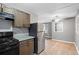 Kitchen featuring stainless appliances and wood cabinets at 5273 Crystal Ln, Atlanta, GA 30349