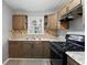 Kitchen featuring wood cabinets and laminate countertops at 5273 Crystal Ln, Atlanta, GA 30349