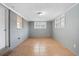 Spacious living room with tile flooring, neutral walls, and natural light from the window at 5273 Crystal Ln, Atlanta, GA 30349
