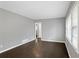 Living room featuring hardwood floors and modern gray paint at 5273 Crystal Ln, Atlanta, GA 30349