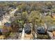A birds eye view showing the property nestled in a mature neighborhood with tree lined streets at 936 Byron Sw Dr, Atlanta, GA 30310