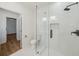 Clean bathroom featuring a glass-enclosed shower and modern fixtures at 936 Byron Sw Dr, Atlanta, GA 30310