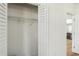 Bright bedroom with closet and new ceiling fan and hardwood floors at 936 Byron Sw Dr, Atlanta, GA 30310