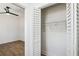 Bright bedroom with closet and new ceiling fan and hardwood floors at 936 Byron Sw Dr, Atlanta, GA 30310