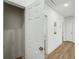 Hallway view with natural light and wood flooring at 936 Byron Sw Dr, Atlanta, GA 30310