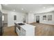 Bright, open kitchen with stainless steel appliances, white countertops, and a modern sink at 936 Byron Sw Dr, Atlanta, GA 30310