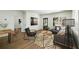 Stylish living room and dining area featuring modern decor and lots of natural light at 936 Byron Sw Dr, Atlanta, GA 30310