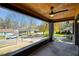Covered porch with fan offering neighborhood views at 936 Byron Sw Dr, Atlanta, GA 30310