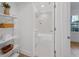 Bright bathroom with a tub, and stylish shelving offering ample storage space at 112 Rosaire Nw Pl, Atlanta, GA 30327