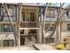 Exterior view of charming townhome with walkways to unit entrances at 112 Rosaire Nw Pl, Atlanta, GA 30327