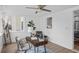 Bright office space boasts a ladder and view of the kitchen at 112 Rosaire Nw Pl, Atlanta, GA 30327