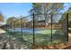Community tennis courts are fenced and provide recreation for residents at 112 Rosaire Nw Pl, Atlanta, GA 30327
