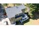 Overhead view of the home's roof, multi-level deck, and well-maintained, private backyard at 1472 Hartman Sw Dr, Lilburn, GA 30047