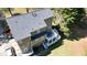 Overhead view of the home and its multi-level deck, with an expansive backyard and mature trees at 1472 Hartman Sw Dr, Lilburn, GA 30047
