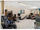 Spacious basement with tile flooring, neutral walls, work-out equipment and natural light at 1472 Hartman Sw Dr, Lilburn, GA 30047