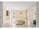 Dining room featuring an intricate tile floor and natural light at 1472 Hartman Sw Dr, Lilburn, GA 30047