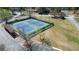 Well-maintained community tennis courts with ample space for parking and neighborhood recreation at 1472 Hartman Sw Dr, Lilburn, GA 30047
