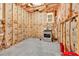 Basement area shows potential with visible insulation, framing, and an installed oven at 3670 Cedar Springs Ln, Loganville, GA 30052