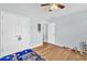 This bedroom has hardwood floors and two closets with white doors at 3670 Cedar Springs Ln, Loganville, GA 30052