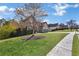 Well maintained two-story home with lush green lawn and mature landscaping at 3670 Cedar Springs Ln, Loganville, GA 30052