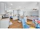 Bright kitchen boasts granite countertops, stainless steel appliances, and hardwood floors at 3670 Cedar Springs Ln, Loganville, GA 30052